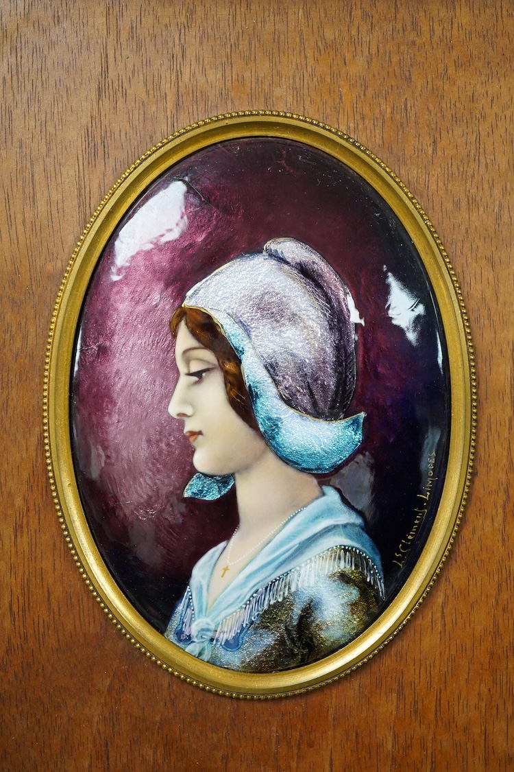 A Limoges framed oval enamel of a portrait of a lady, signed J Clement, 12cm.